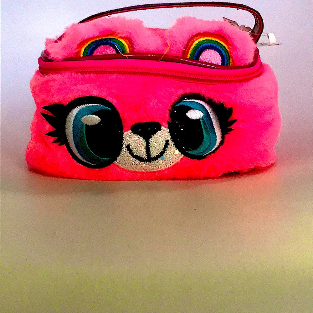 Cute girl bag. From Claire’s, it’s medium small, and pink/rainbow.